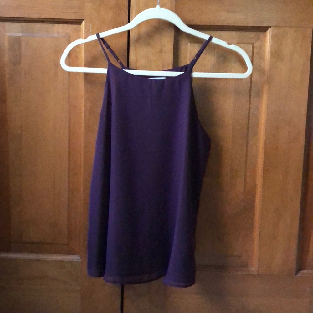 Halter blouse with adjustable straps.